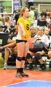 Volleyball line judge signaling ball in